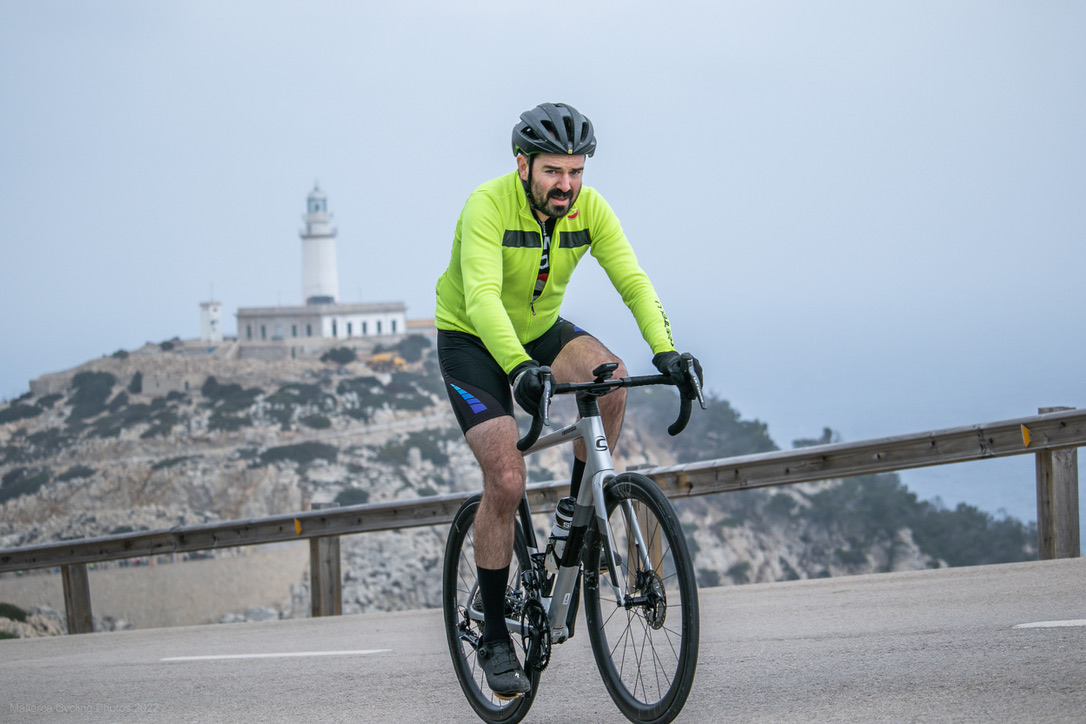 Cycling in Mallorca below Cap de Formentor lighthouse